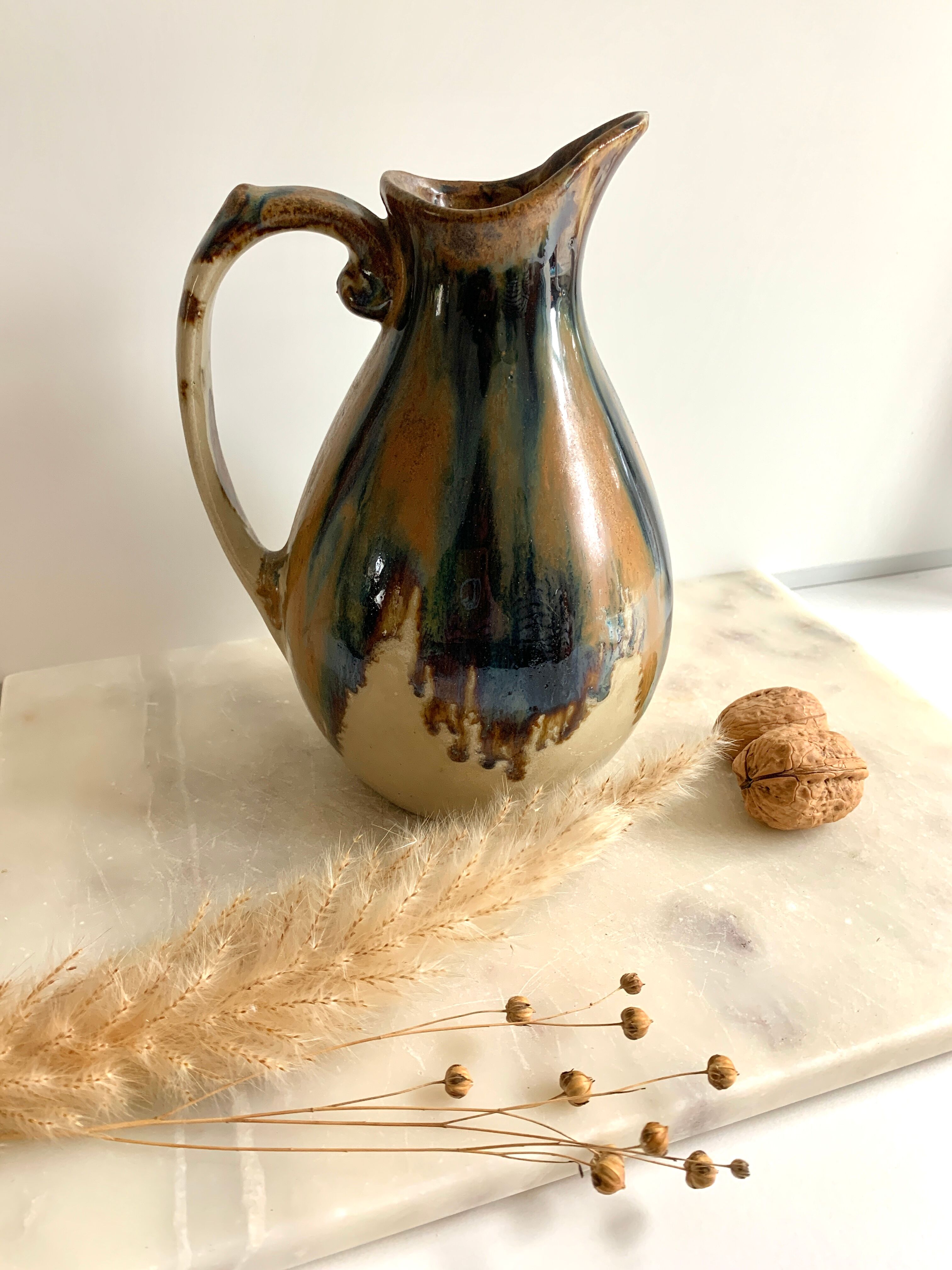 Pitcher in flamed sandstone