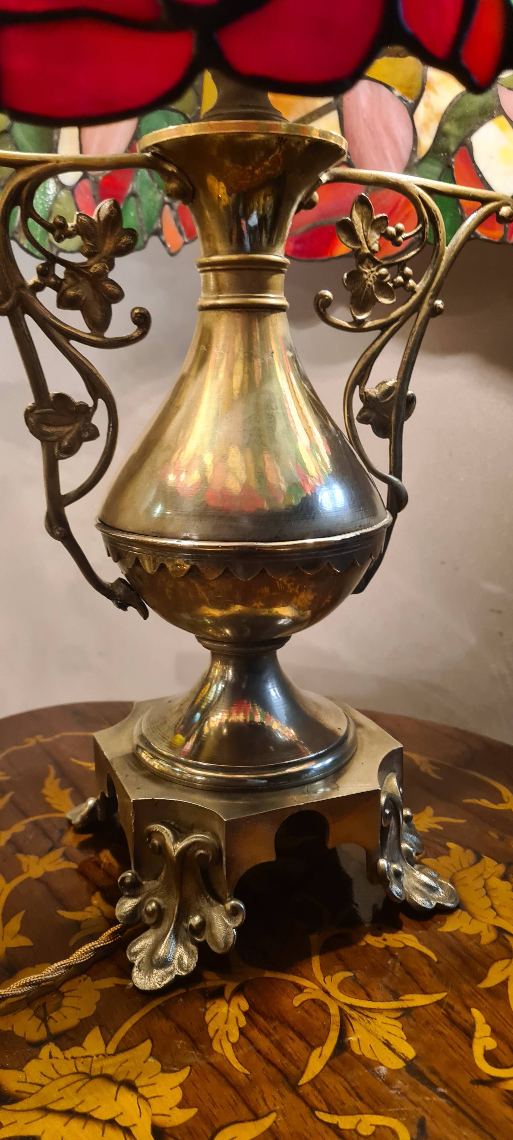 Antique bronze lamp and Tiffany-style stained glass shade. 46x32