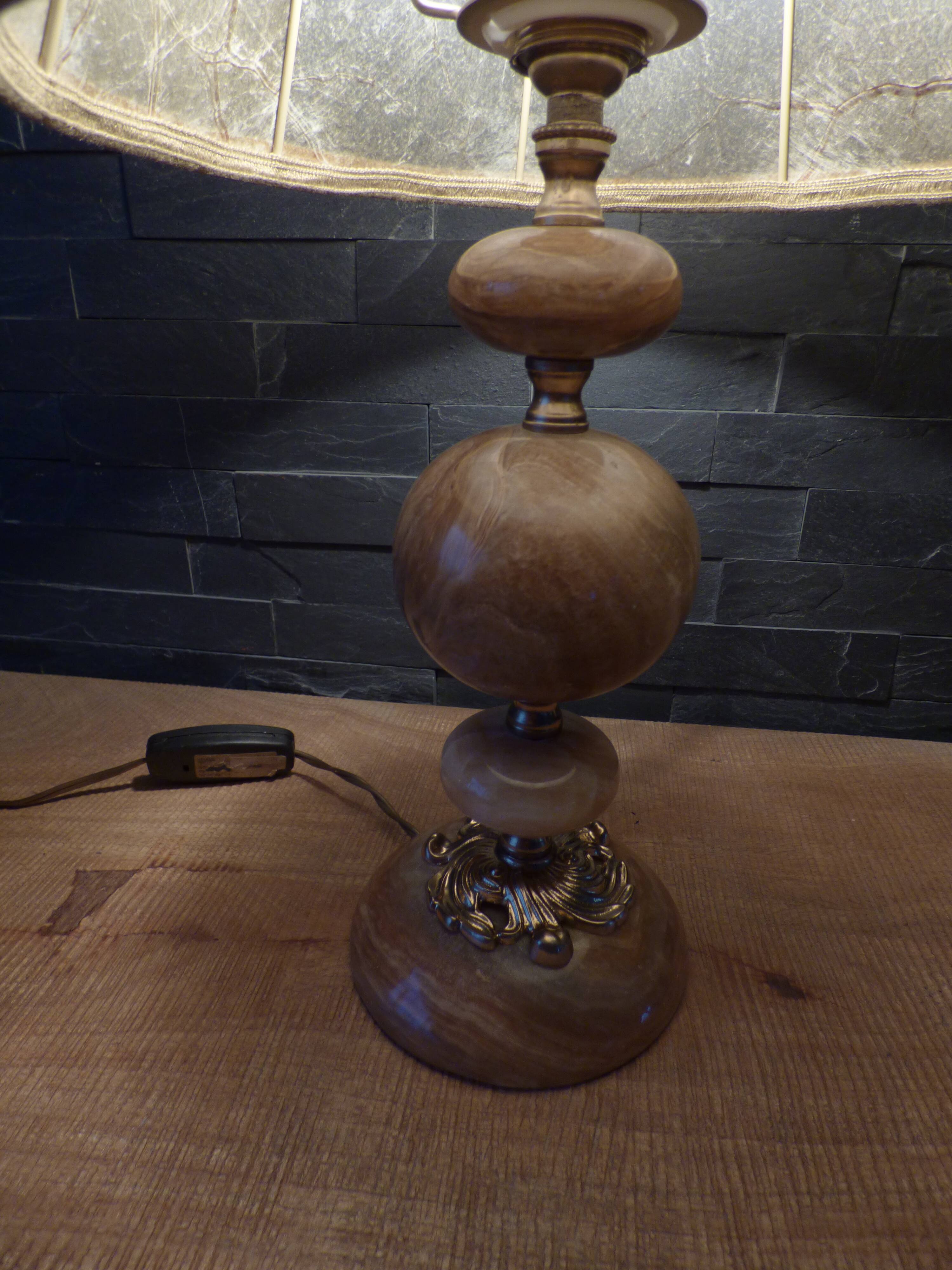 Lamp with base in polished beige-brown stones and its leather lampshade