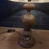 Lamp with base in polished beige-brown stones and its leather lampshade
