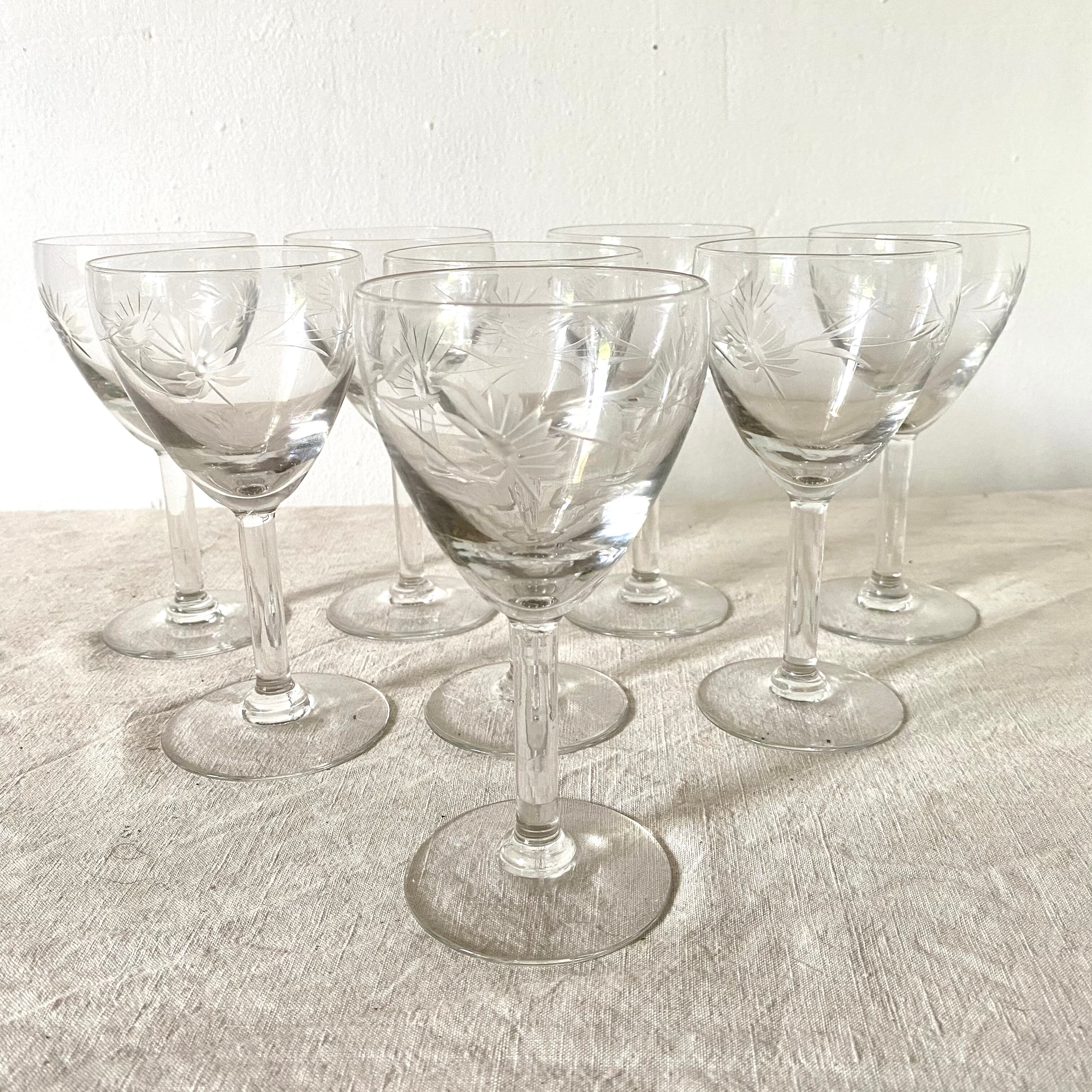Wine glasses carved floral decoration