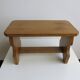 Petit tabouret repose-pieds en bois