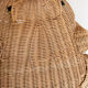 Wicker and braided rattan magazine door by Olivier Cajan