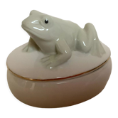 Boîte ovale avec une grenouille