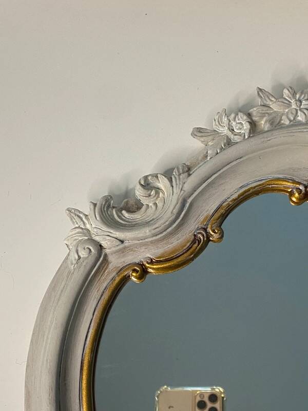 Magnificent patinated and gilded baroque style mirror
