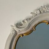 Magnificent patinated and gilded baroque style mirror