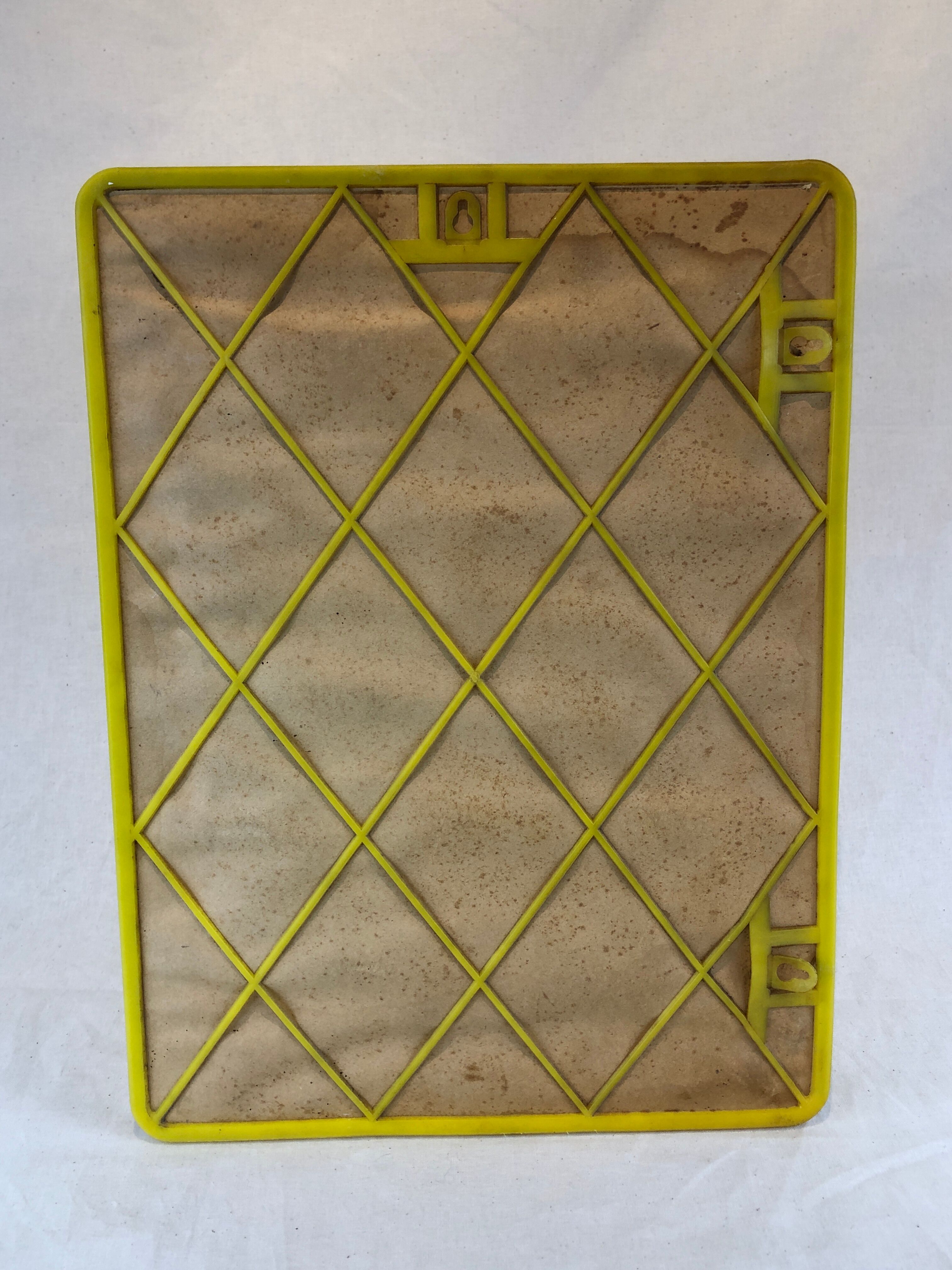 1970s mirror yellow plastic frame