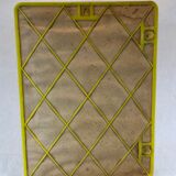 1970s mirror yellow plastic frame