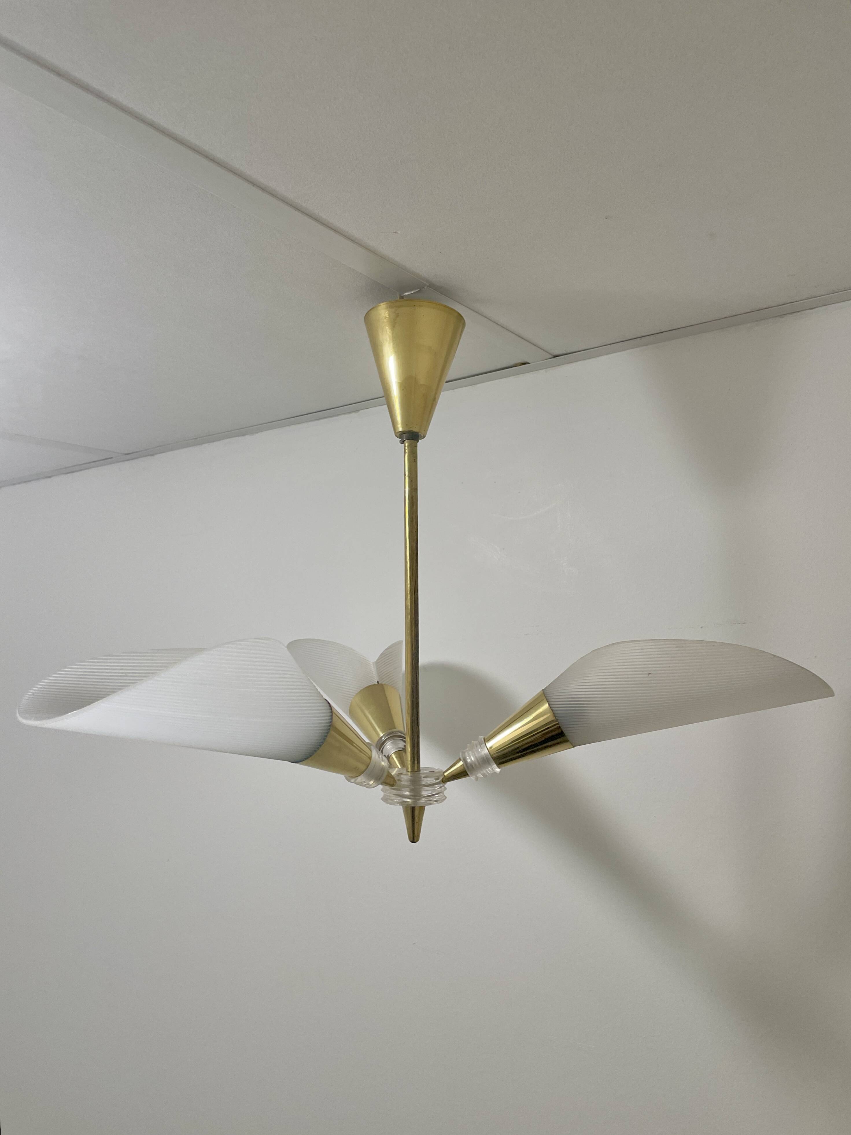 Vintage chandelier with plexiglass and brass cones