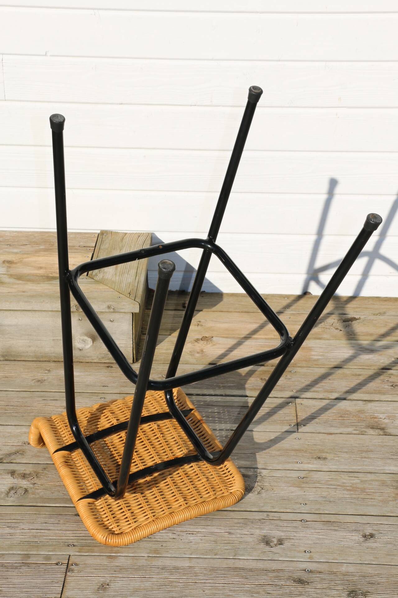 3 rattan and black metal stools dirk van sliedregt