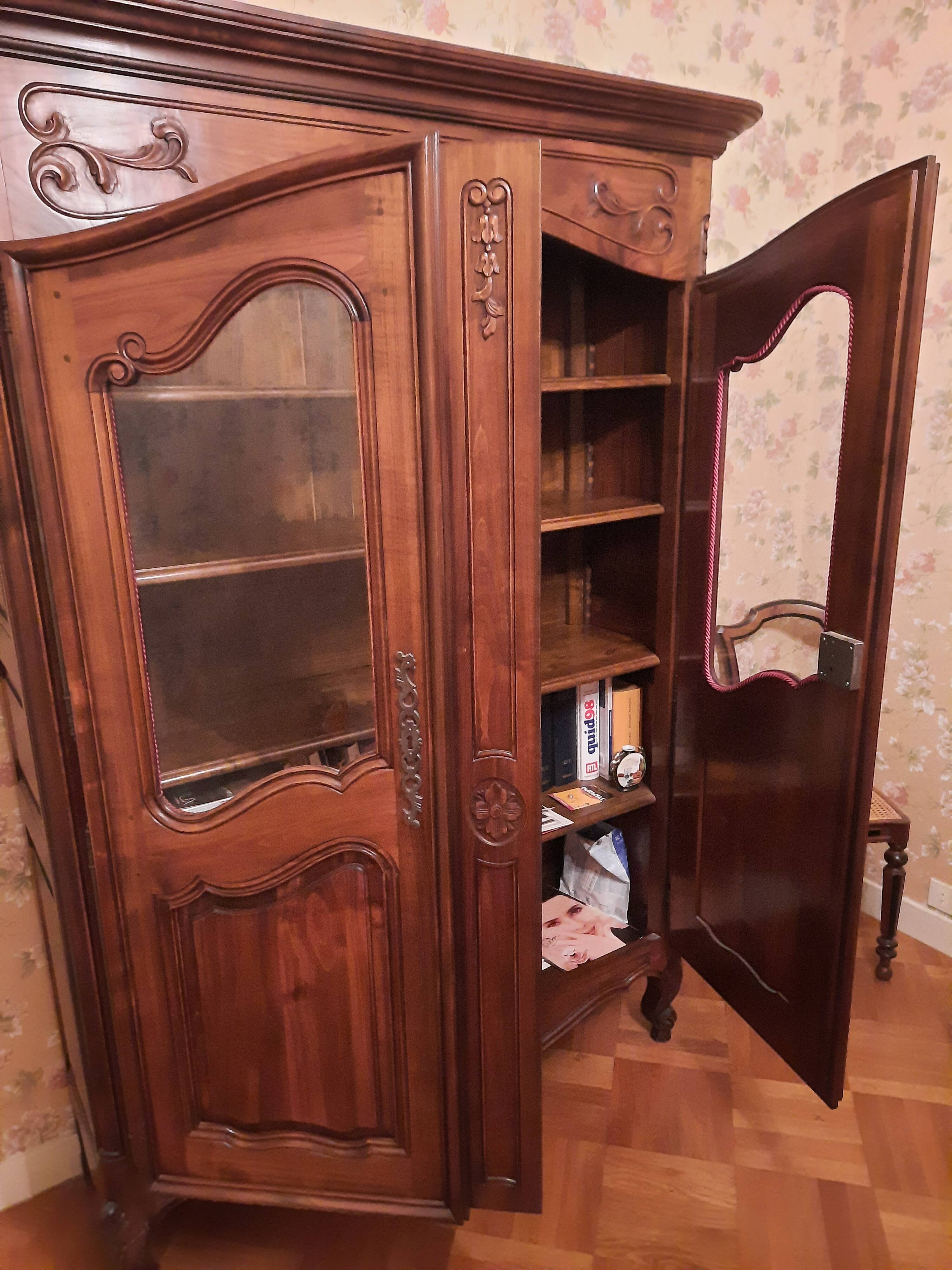 Regency bookcase in solid cherry wood stained walnut.