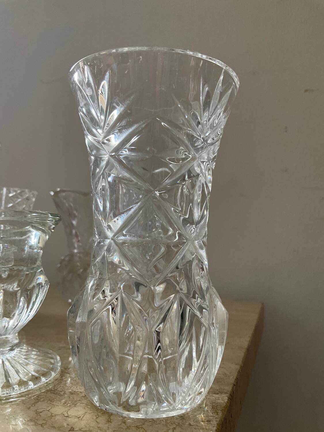 Series of 6 miniature vases in chiseled glass