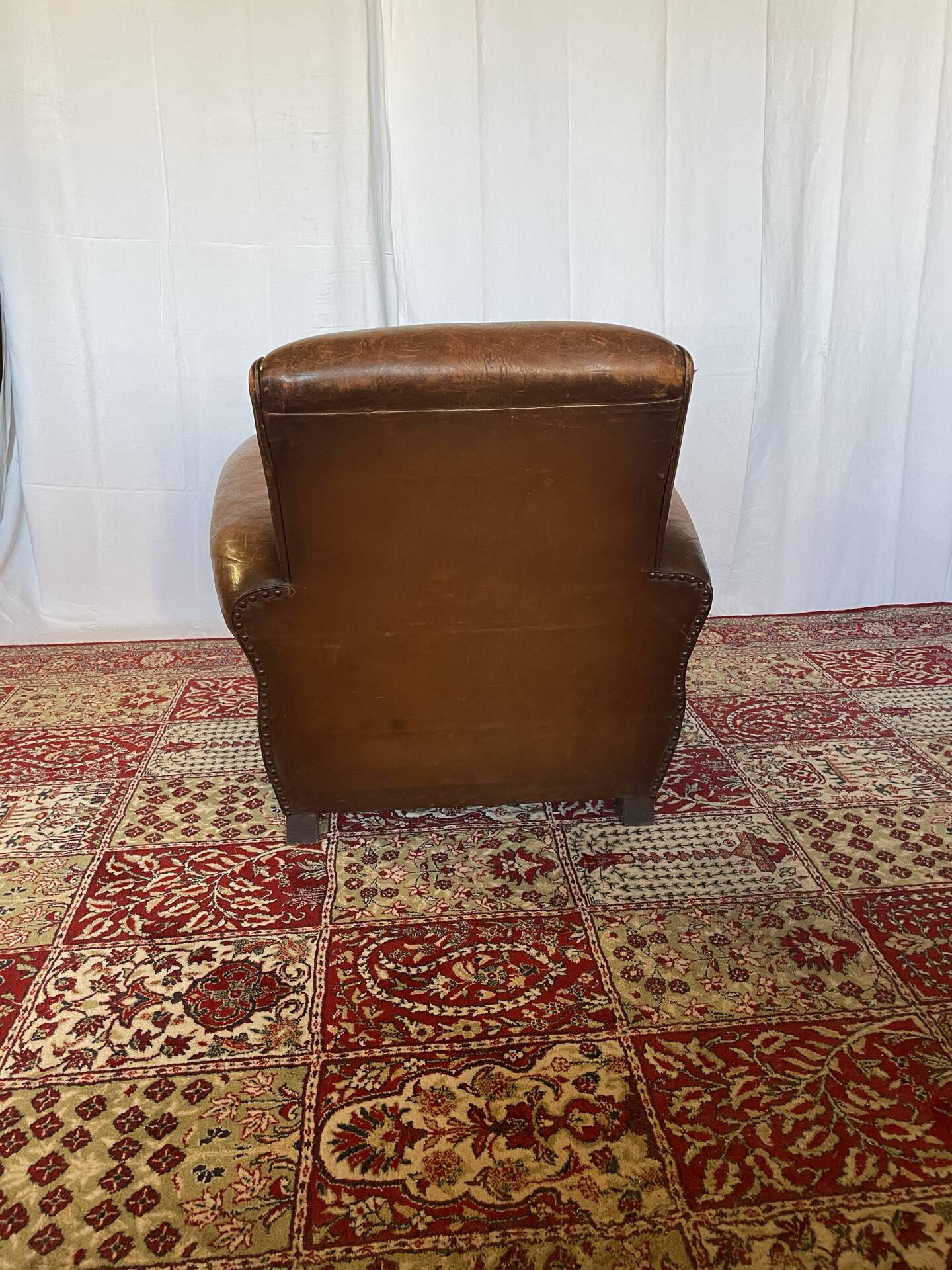 Vintage club armchair in cowhide leather
