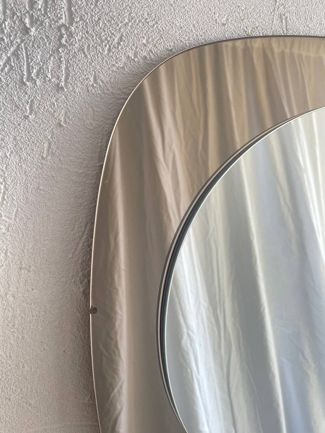 Miroir en verre fumé 70’s space age