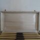 12 vintage stainless steel knives bone or bakelite sleeves in case