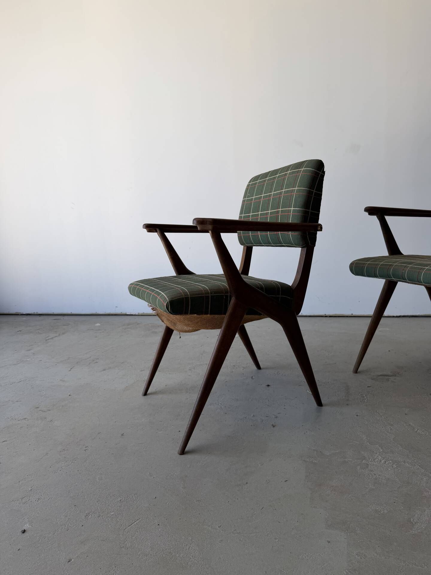 Pair of armchairs with a Scandinavian design in vintage teak from the 1960s.