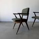 Pair of armchairs with a Scandinavian design in vintage teak from the 1960s.