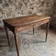 French antique writing desk in walnut, Louis XVI style, late 19th century, circa 1880–1900.