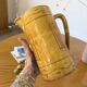 Vintage yellow glazed stoneware jug