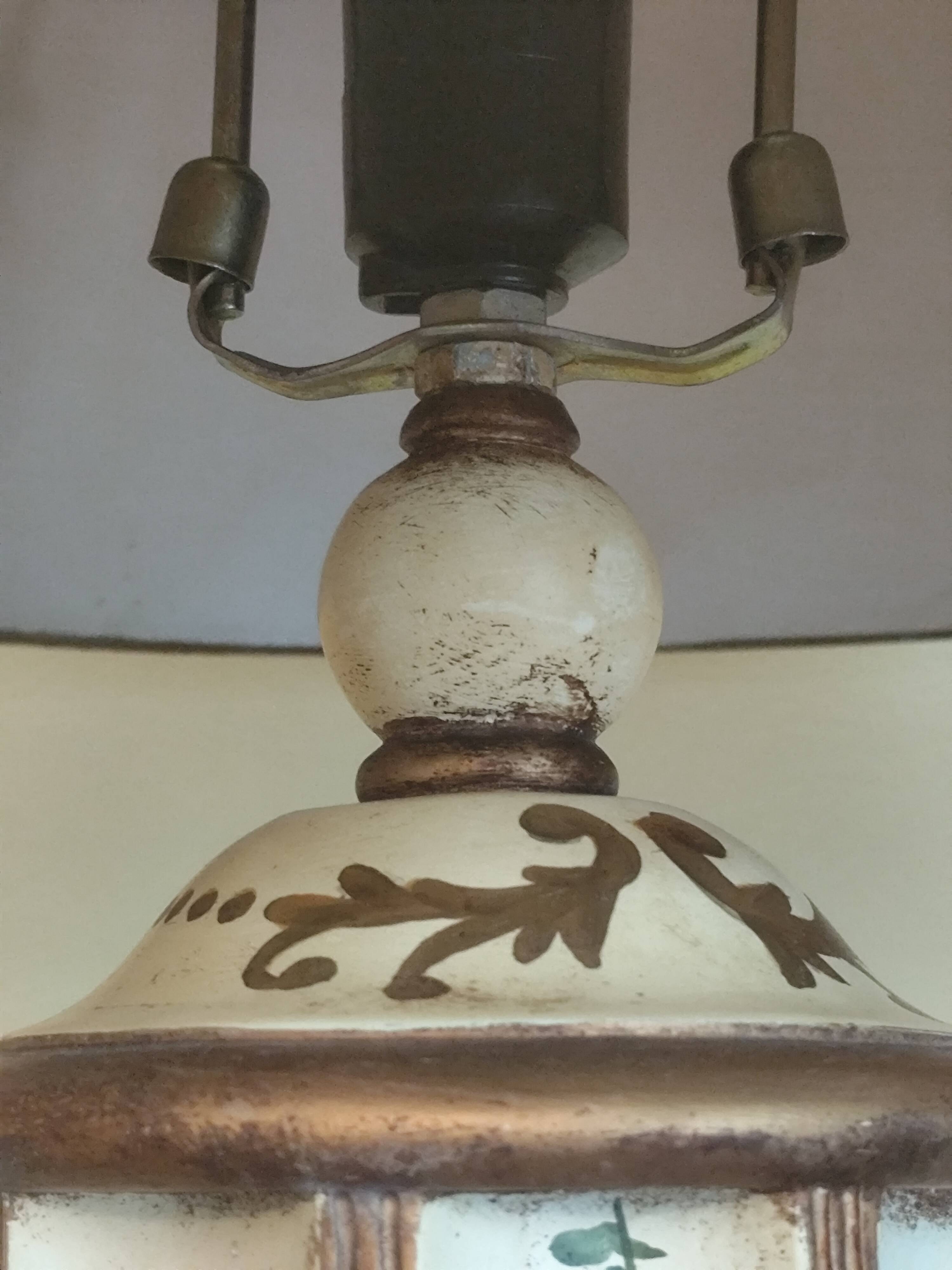 Large pagoda lamp painted with floral patterns and metal shade.