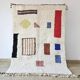 Off-white Moroccan rug with geometric patterns, 250cm x 150cm