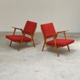 Pair of armchairs in mottled red and wood by Uluv, former Czechoslovakia 1960