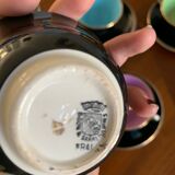 Black and multicolored coffee cup servings