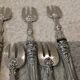 11 silver oyster forks, 800 Minerva style, Louis Philippe