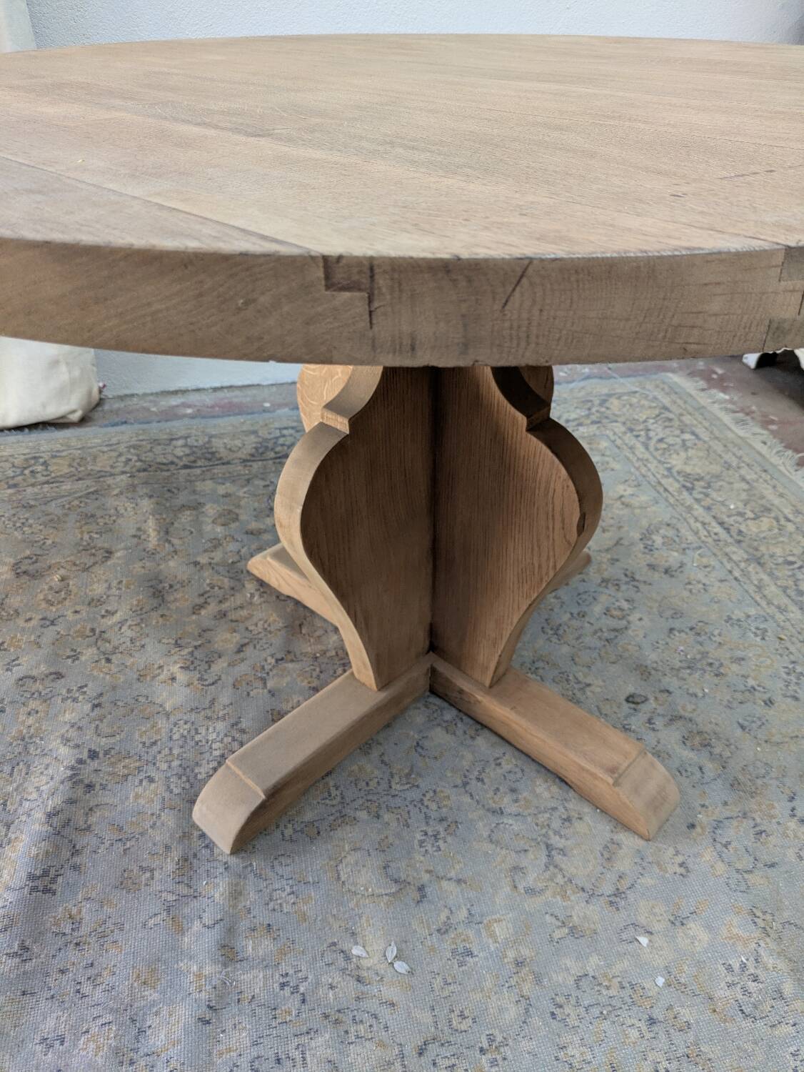 Round table in raw oak