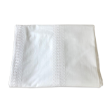 Nappe with embroidered stripes