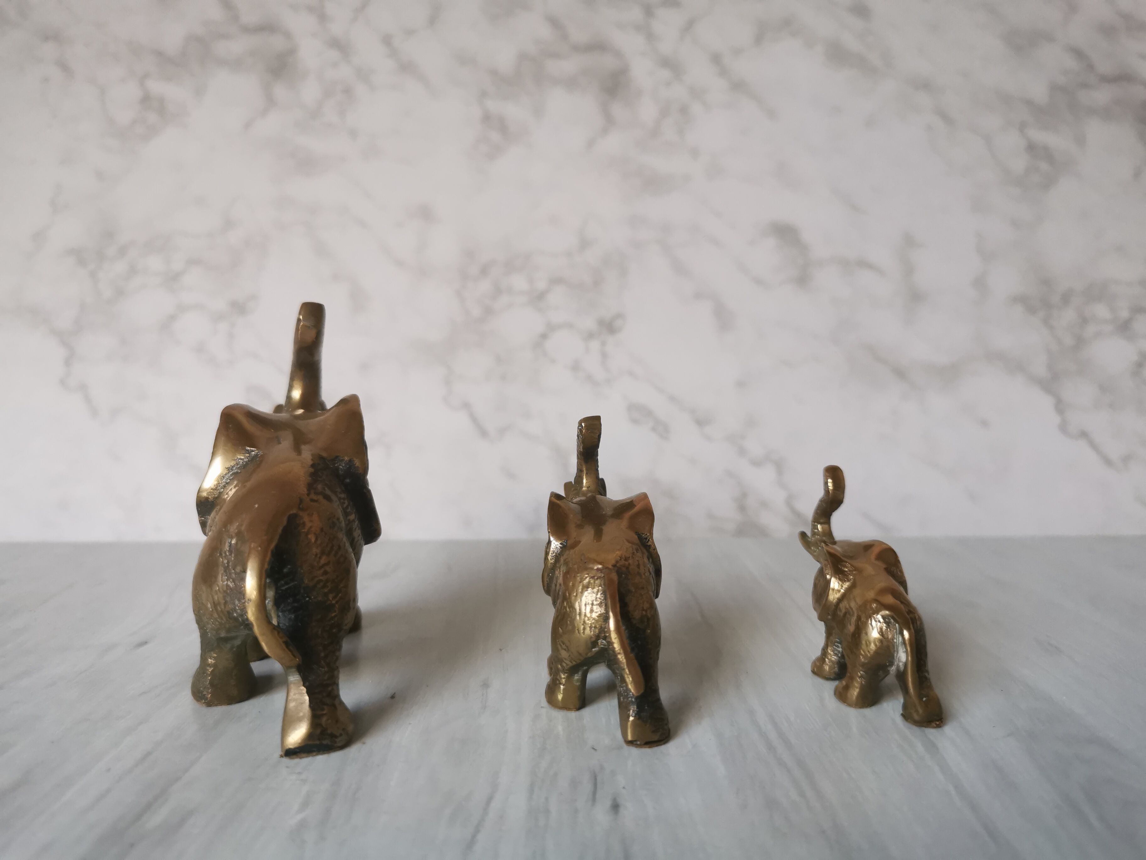 Trio of brass elephants