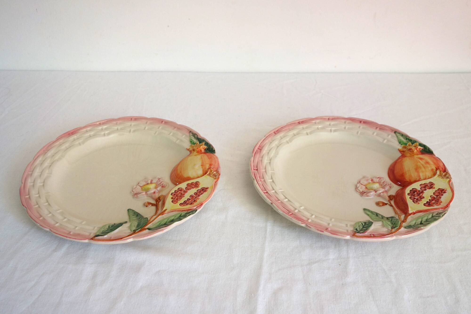 2 vintage pomegranate slip plates signed Francesco Guarino