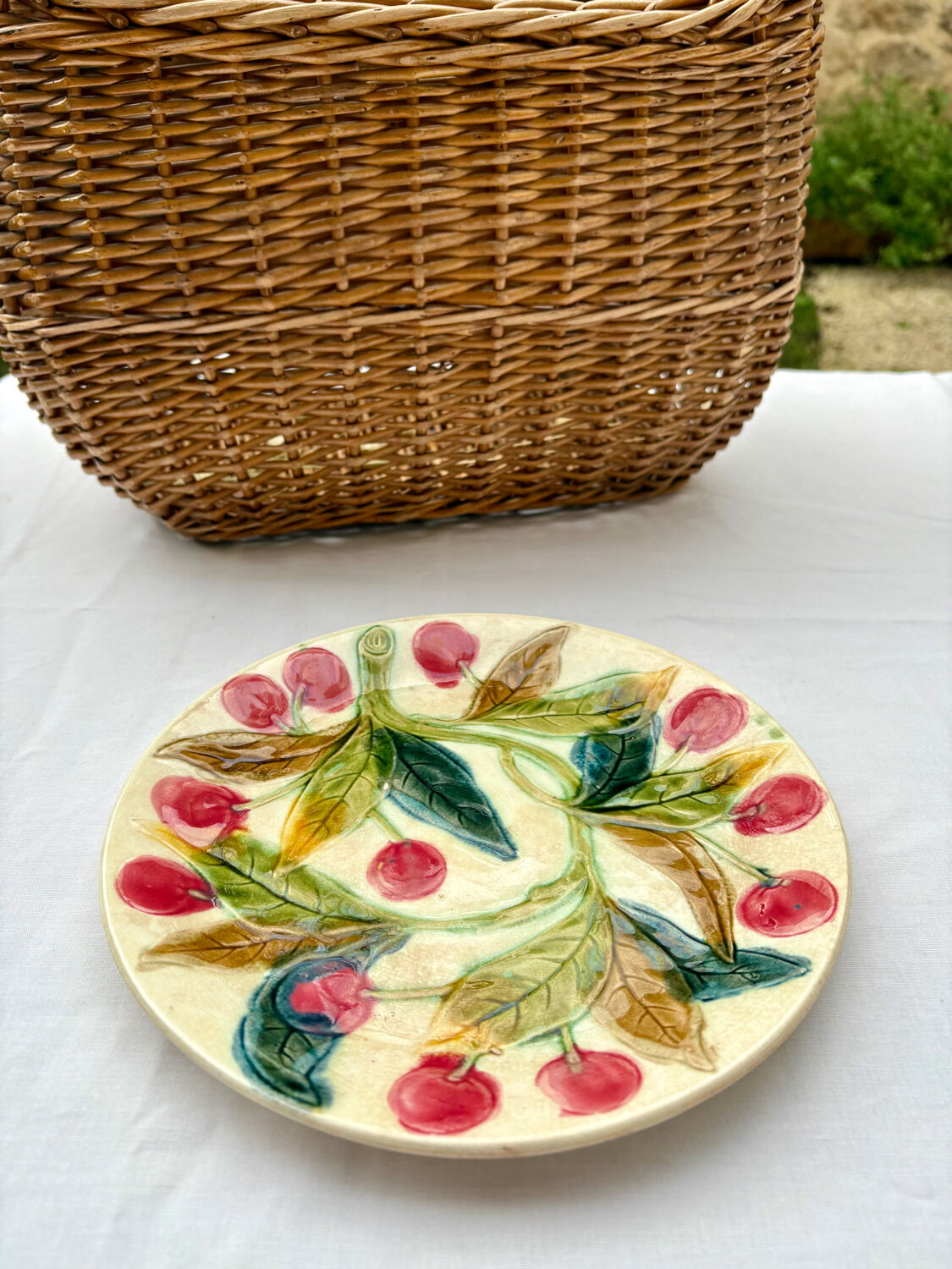 Very old barbotine plate with cherries