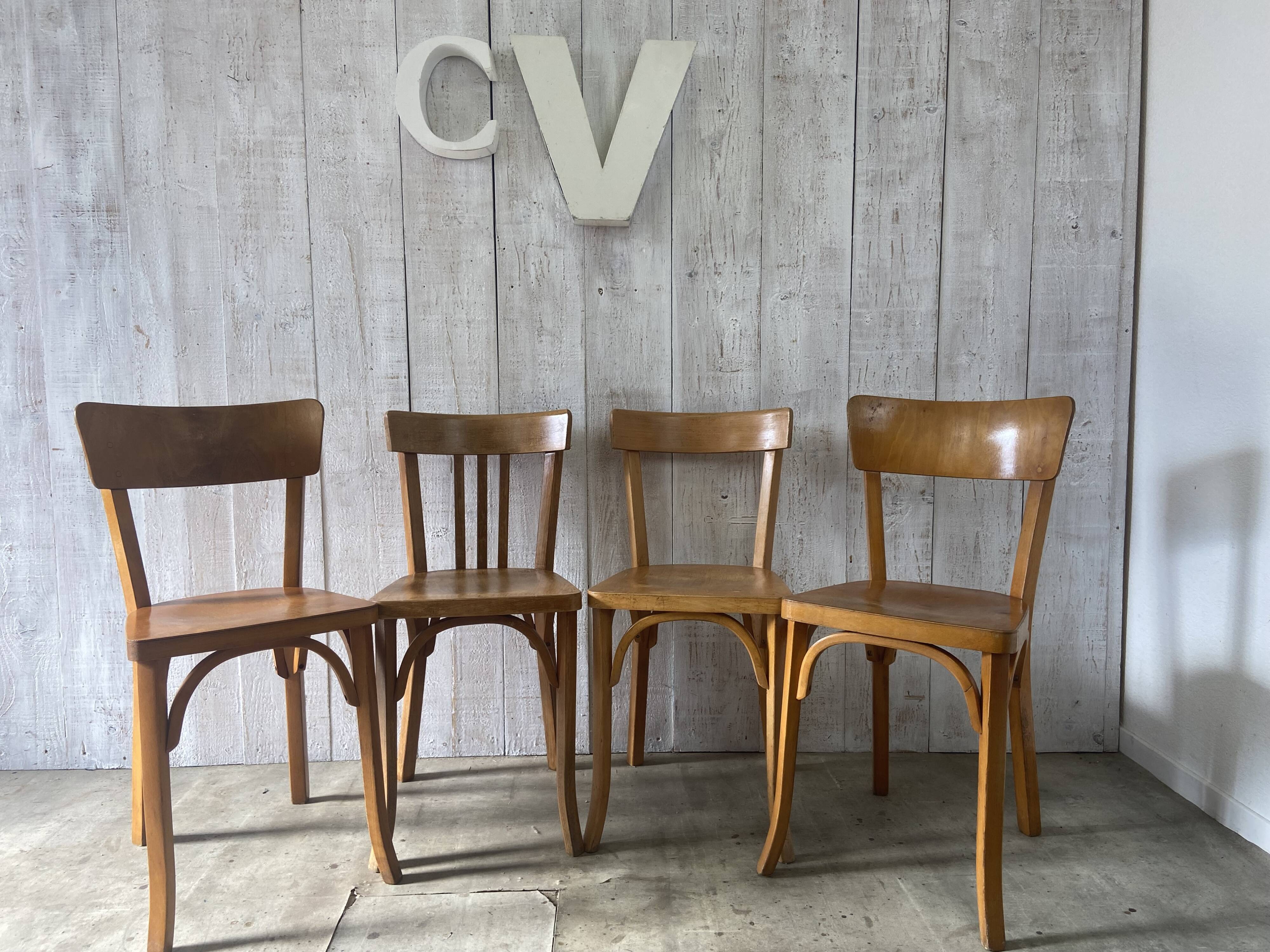 Mismatched Baumann bistro chairs