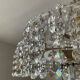 Vintage lucite chandelier with a cascade of crystal pendants from the 1970s.