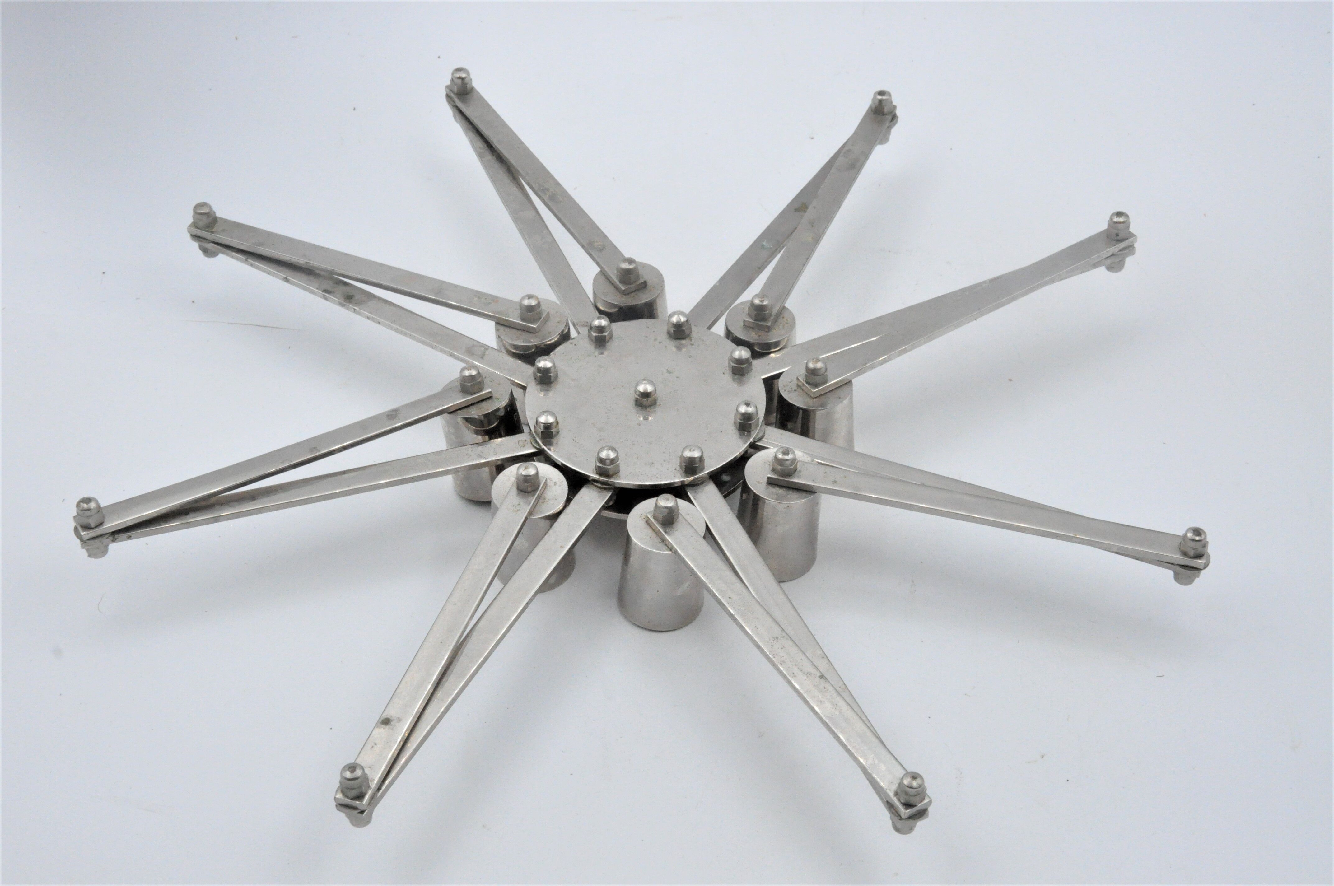 Design candle holder in silver metal, with 8 candles, modular spider
