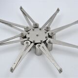 Design candle holder in silver metal, with 8 candles, modular spider