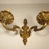 Pair of two-light wall lights in gilded bronze