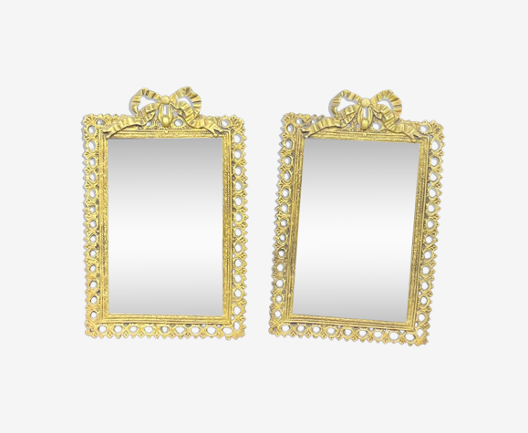 Paire de miroirs, laiton doré, verre biseauté, surmonté d'un nœud, ruban, style Louis XVI, finXIXème