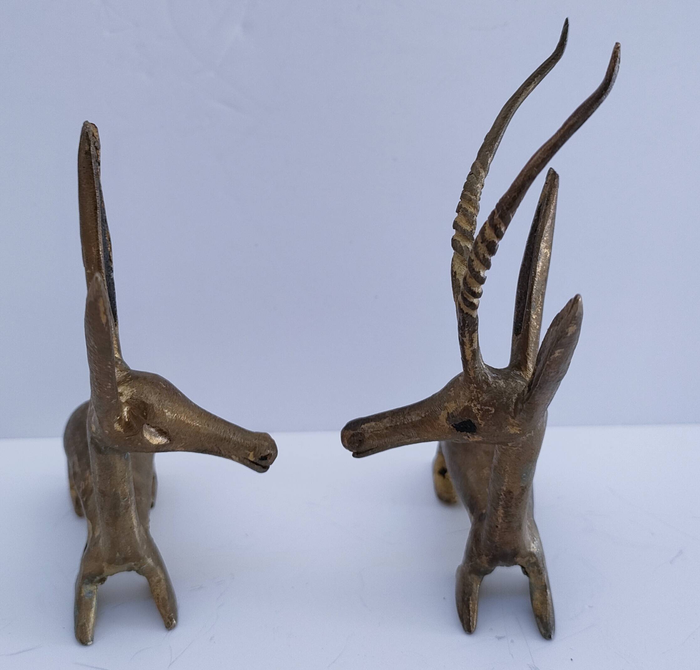 four vintage brass gazelle antelope sculptures