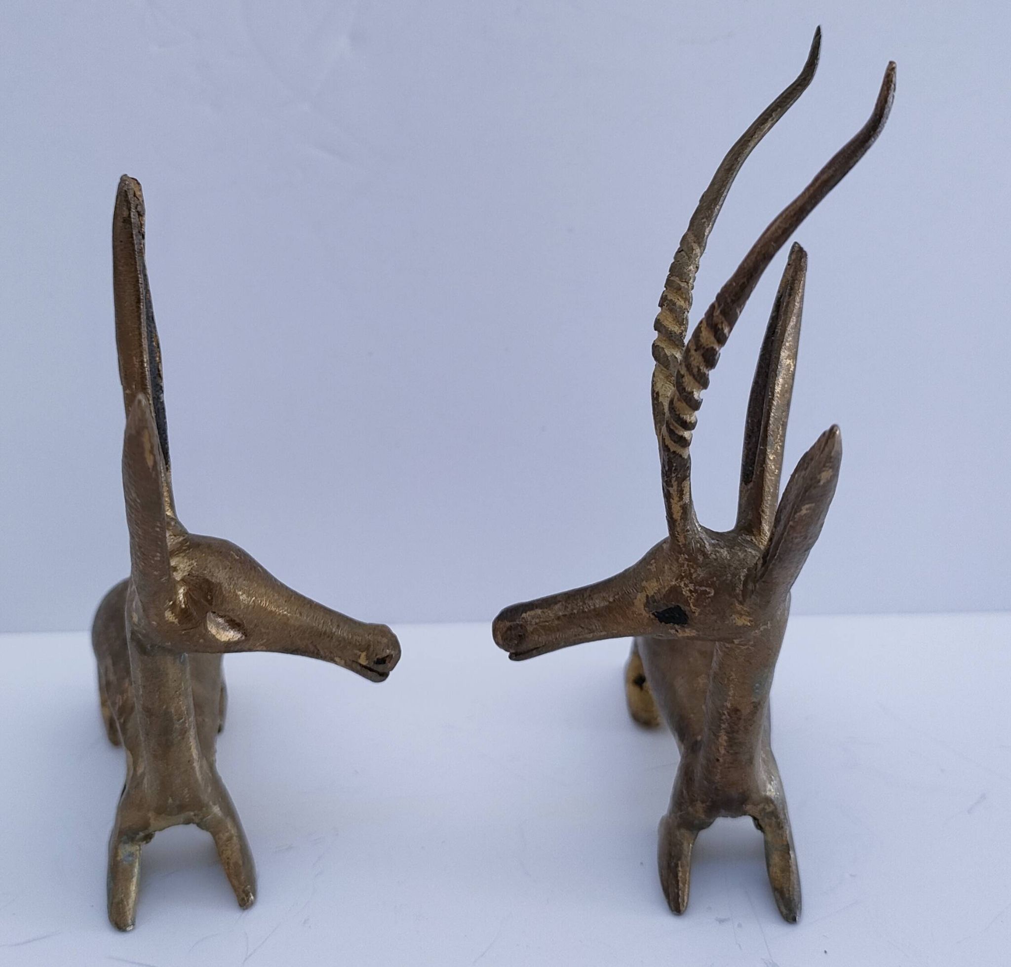 four vintage brass gazelle antelope sculptures