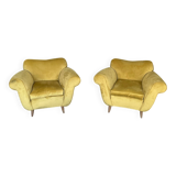 A pair of 1920s armchairs with an ottoman. Good condition.