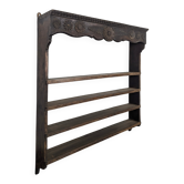 Wall-mounted shelf with a carved oak flower drain.
