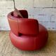Curl armchair in red leather by Roche Bobois