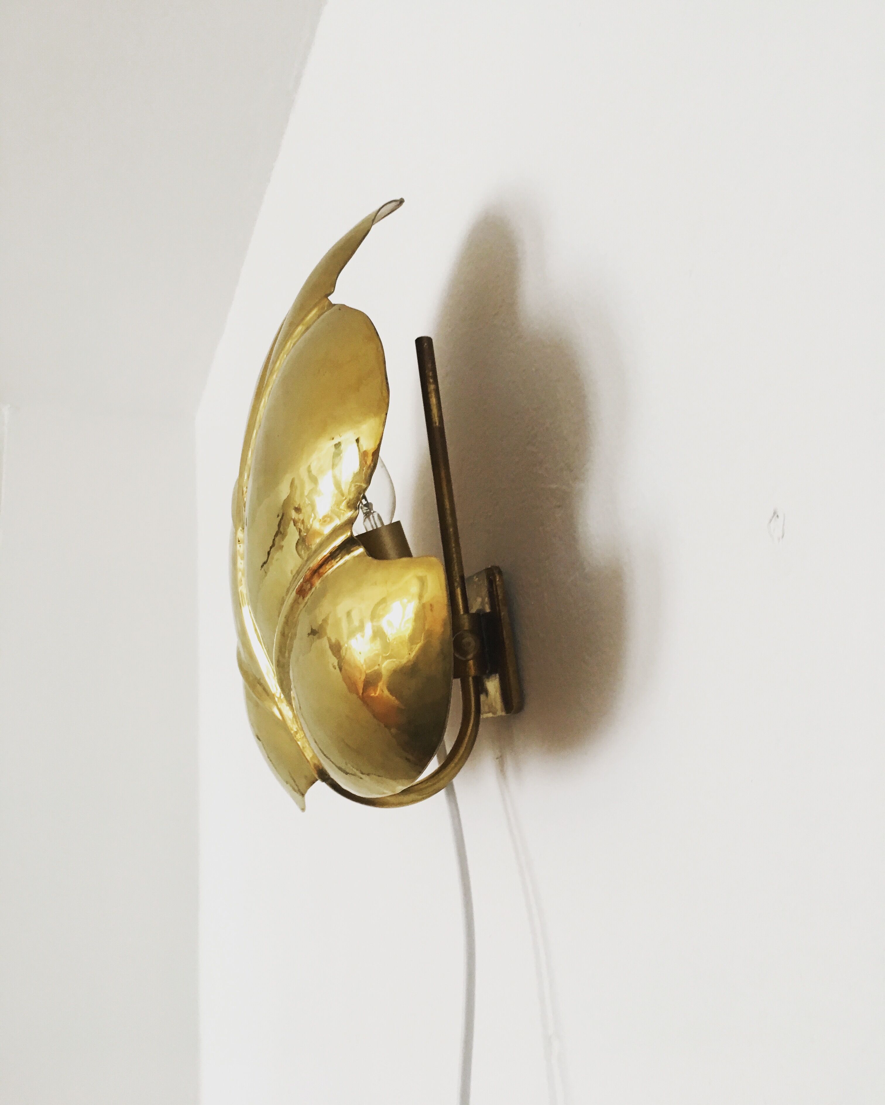Hollywood Regency brass leaf wall lamp