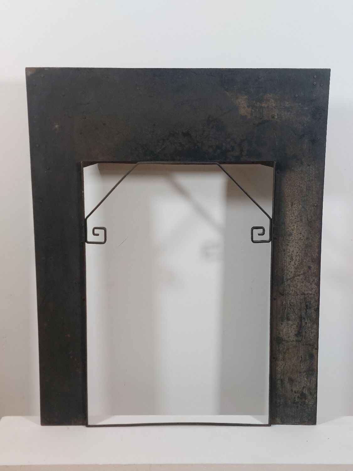 Hand-forged spiral decorative fire surround.