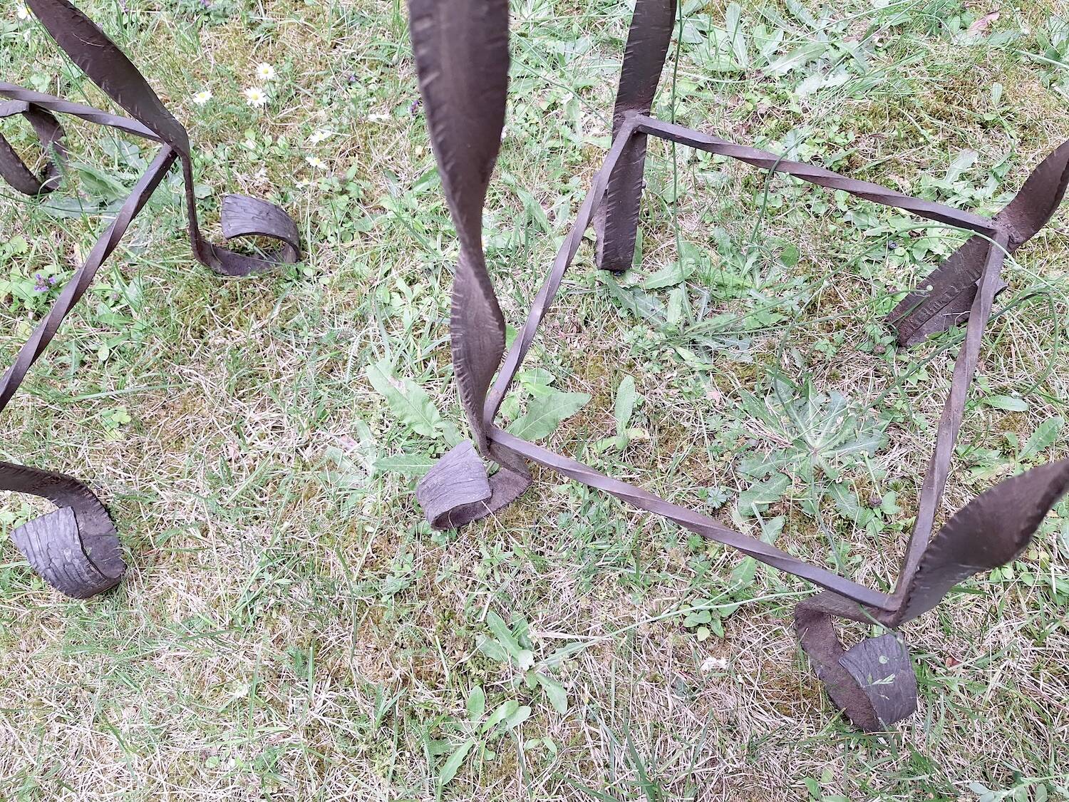 Pair of Brutalist patinated iron and veined marble columns, 1960s