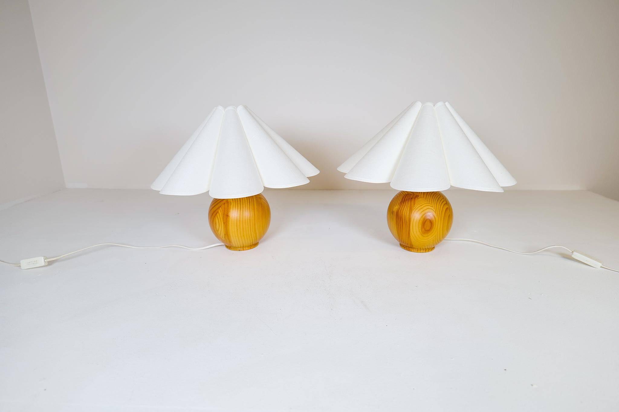 Sculptural modern table lamps from the mid-century in solid pine, Sweden, 1970s.