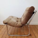 Vintage tubular chrome and velvet armchair
