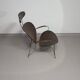 Fauteuil conçu par Yuzuru Yamakawa Structure en métal. Assise et dossier en rotin tressé.